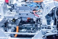 Chassis of the electric car with powertrain and power connections closeup. Blue toned. Royalty Free Stock Photo