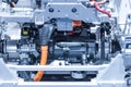 Chassis of the electric car with powertrain and power connections closeup. Blue toned. Royalty Free Stock Photo