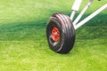 Chassis turboprop airplane grass on meadow field. Royalty Free Stock Photo