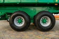 Chassis with wheels for commercial cargo transportation. Traffic safety. A large black rough tire for trucks. Working in a quarry Royalty Free Stock Photo