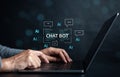 Chat bot intelligence Ai. Businessman using chat in computer Chat with AI Artificial Intelligence, developed by OpenAI generate. Royalty Free Stock Photo