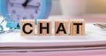 CHAT Word Written In Wooden Cube, business concept