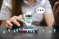 Chatbot answering questions online, robot assistant help on website