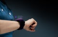 Chatbot, LiveChat Technology Concept. Woman Using Smart Watch To Make Conversation with an Artificial Intelligence Service.
