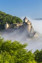 Chateau de Castelnaud in the morning mist, Dordogne