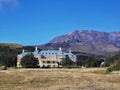 Chateau Tongariro and snowless Mount Ruapehu volcano in New Zealand in the afternoon Royalty Free Stock Photo