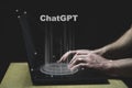 ChatGPT hologram on PC keyboard typing. ChatGPT is a chatbot launched by OpenAI