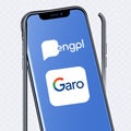 Chatgpt from OpenAI and the bard logo from GoogleAI on a translucent background of a smartphone. AI search engine technology.