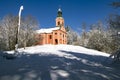 The chatholic church on the top of the hill covered by snow in Ljubljana