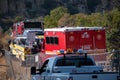 Firetrucks and crews from LACFD and VCFD arrive on scene to fight a brushfire