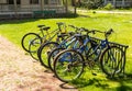 Chautauqua, New York, USA May 11. 2023 A bike rack on the grounds of the Chautauqua Institution filled with bikes Royalty Free Stock Photo