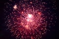 Cheap beautiful bright fireworks, red, in the night sky Royalty Free Stock Photo