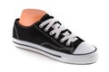Cheap black and white sport shoes Royalty Free Stock Photo