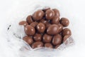 Cheap egg shape chocolate almond nut in clear plastic bag sold in bulk