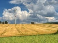 Cheap energy. Wind energy turbines in field with blue sky Royalty Free Stock Photo