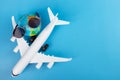 Cheap flight booking, airplane tickets, international flights, travel and trips, plane and globe on a blue background with copy Royalty Free Stock Photo