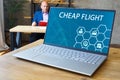 CHEAP FLIGHT phrase on the laptop