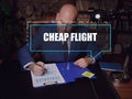 CHEAP FLIGHT phrase on the screen. Auditor checking financial report Cheapflights is a travel fare metasearch engine