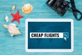 Cheap flights searching, website page opened in digital tablet l