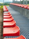 Cheap red stadium seats view. Two rows of simple chairs Royalty Free Stock Photo