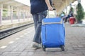 Cheap Travel and Lifestyle concept. Holiday Time, Young Solo Traveler woman wearing jeans and walking at train station. Asian Royalty Free Stock Photo