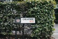 Cheapside street name sign on a fence in the City of London, UK. Royalty Free Stock Photo