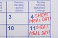 Cheat Meal Day Text Written On Calendar