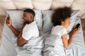 Cheating Black Husband And Wife Using Smartphones Lying In Bedroom Royalty Free Stock Photo