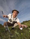 Cheating golfer Royalty Free Stock Photo