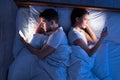 Cheating Spouses Using Smartphones Lying In Bed At Night, Top-View Royalty Free Stock Photo