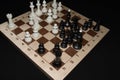 Chechered board under black pieces for game concept Royalty Free Stock Photo