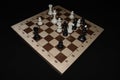 Chechered board under the chessmen for game theme Royalty Free Stock Photo