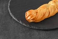 chechil cheese pigtailed on slate stone plate, selective focus Royalty Free Stock Photo