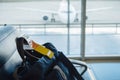 Check-in baggage on the chair in waiting lounge of airport