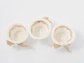 Check miniature baskets of vines on a white background