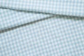 Blue check pattern fabric fold background Royalty Free Stock Photo