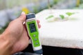 Check pH value of water bin of hydroponics Royalty Free Stock Photo