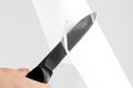 Check the sharpening of knife blades on paper Royalty Free Stock Photo