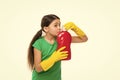 Check smell. Girl in rubber gloves for cleaning hold big plastic bottle chemical soap liquid white background. Use