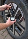 Check the tire pressures with gauge