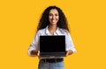 Check This Website. Happy Woman Holding Laptop Computer With Black Blank Screen Royalty Free Stock Photo