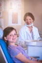 Check your teeth before they become a big concern. a little girl at the dentist for a checkup. Royalty Free Stock Photo