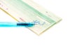 Checkbook with pen on white background. Royalty Free Stock Photo