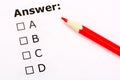Checkboxes questionnaire with red pencil. Testing and exam concept. Royalty Free Stock Photo