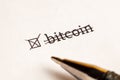 Checked checkbox with word bitcoin at wait background. questionnaire concept