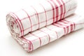 Checked dish towel rolled