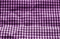 Checked fabric texture in blur effect in purple tone Royalty Free Stock Photo