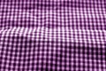Checked fabric texture in blur effect in purple tone Royalty Free Stock Photo