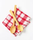 Checked tea towel and wooden spoons Royalty Free Stock Photo