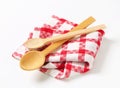 Checked tea towel and wooden spoons Royalty Free Stock Photo